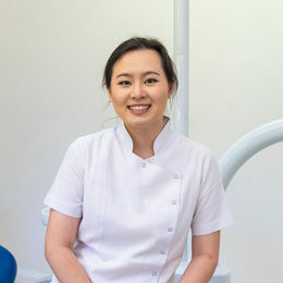 Headshot of smiling dentist Dr Cheryl Fu